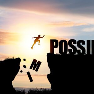 Mindset,Concept,,silhouette,Man,Jumping,Over,Impossible,And,Possible,Wording