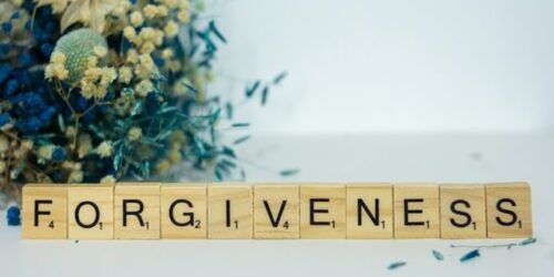 F O R G I V E N E S S is spelled out in Scrabble Tiles (Alex Shute, Unsplash)